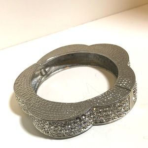 Silver w stones flower shaped bracelet